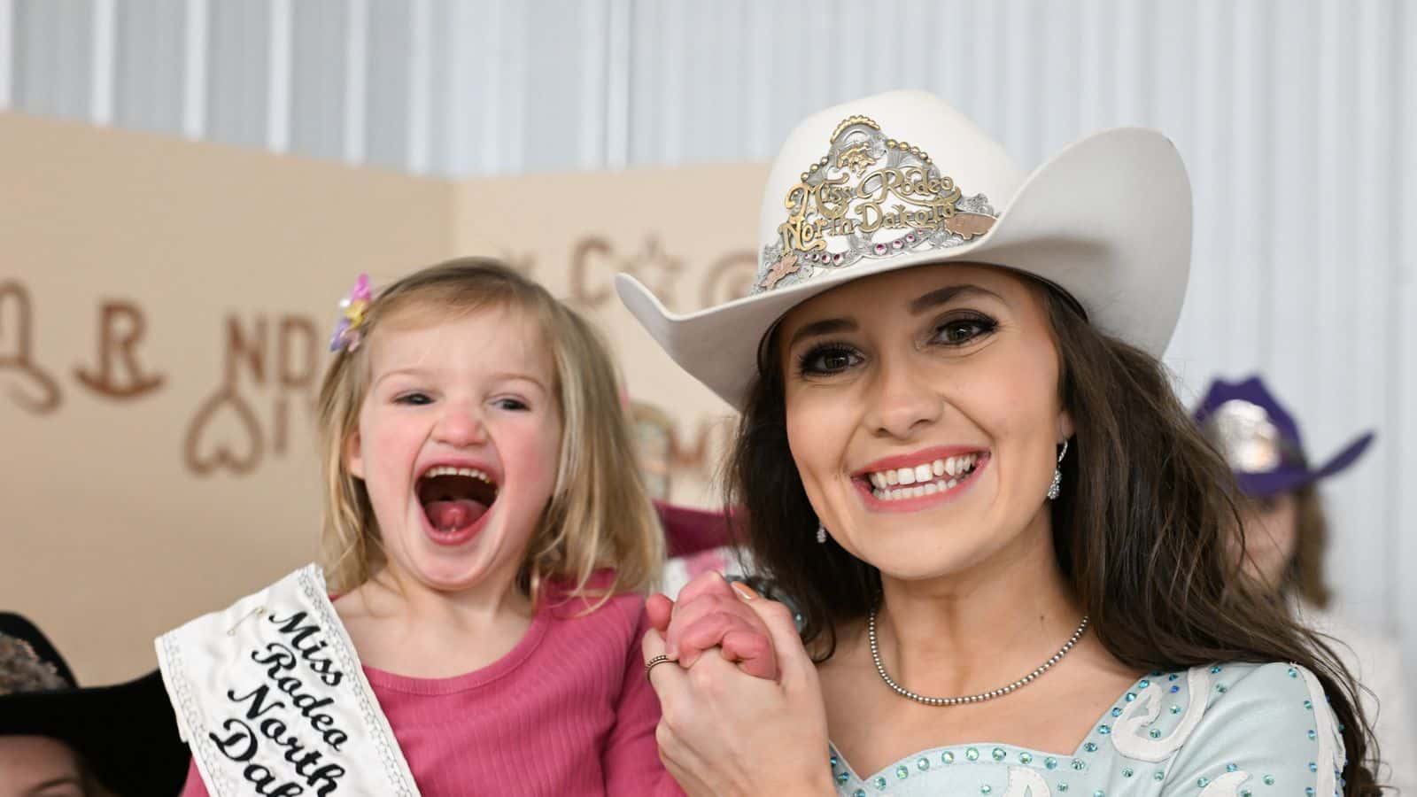 Hicks poses with her niece, Kyler (Sissy), at the Miss Rodeo North Dakota coronation party.