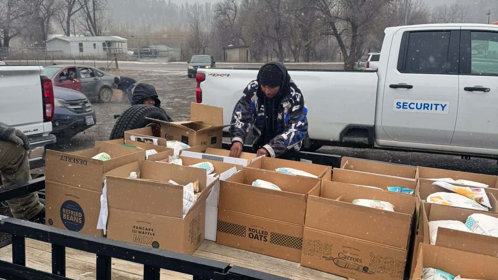Volunteers load up a trailer with boxes of food that were distributed to each district on the Northern Cheyenne Reservation, Montana, Wednesday, Nov. 26, 2025. (Generations for Hope/Tonah Fishinghawk-Chavez)
