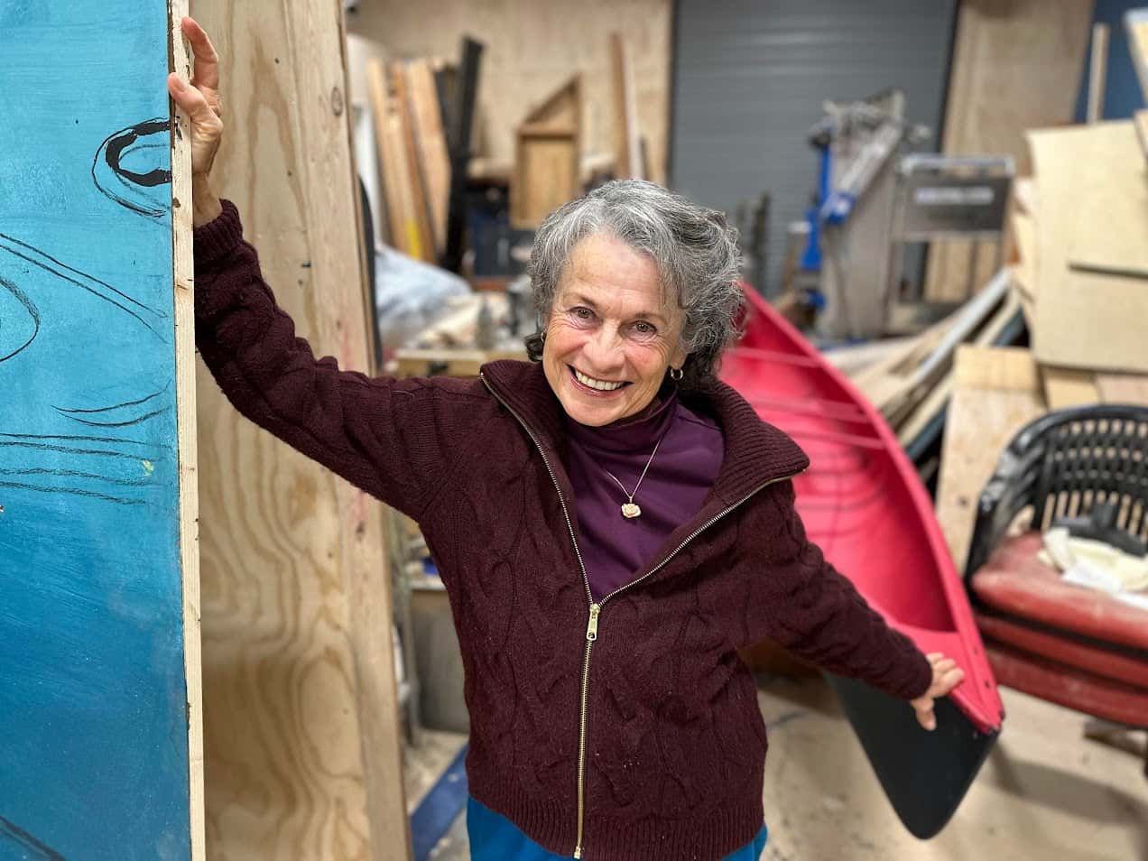 Director and co-playwright Theresa May inside the VLT scene shop with scenic flats and canoe, Wednesday, Oct. 22, 2025. (Buffalo’s Fire/Brian Bull)