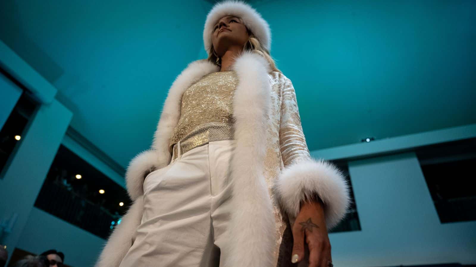 Model Kenzi Sehguk Osgood wears a design by Iñupiaq artist and fashion designer Jackie Qataliña Schaeffer at the Far North Fashion Show in Anchorage, Alaska, Wednesday, July 30, 2025.