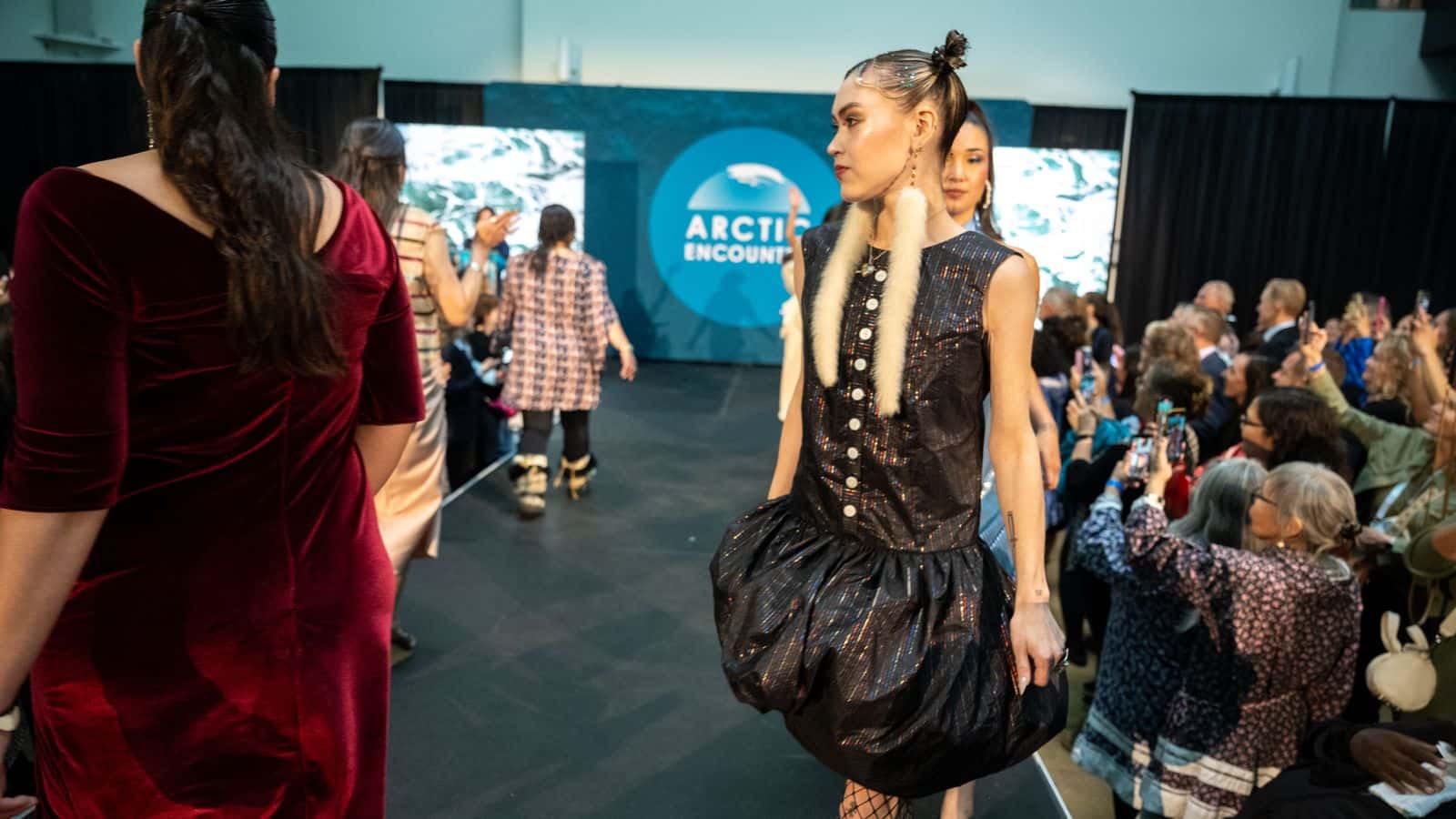 Models walk the runway wearing a collection by Unangax̂ fashion designer Mary Kelsay at the Far North Fashion Show in Anchorage, Alaska, Wednesday, July 30,2025. (Photo credit: Matt Waliszek)