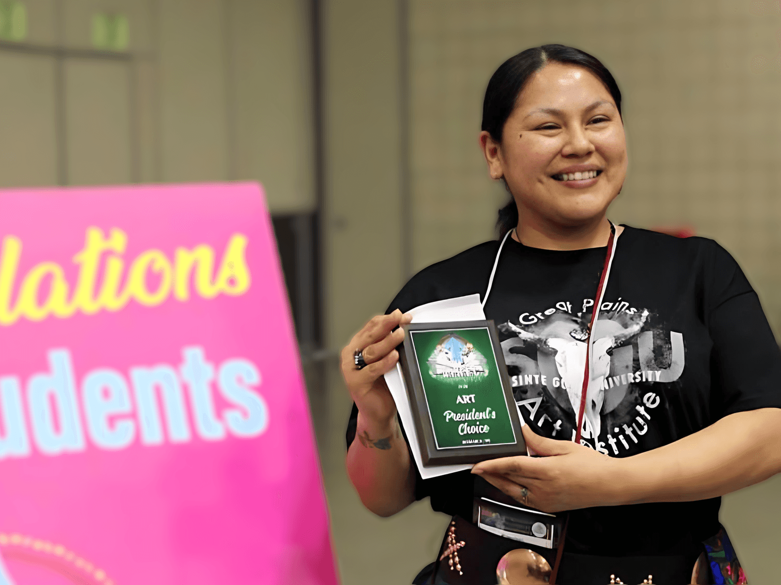 Raechel Herman from Sinte Gleska University wins the President’s Choice in Art award at AIHEC’s Student Awards Banquet, Bismarck, North Dakota.