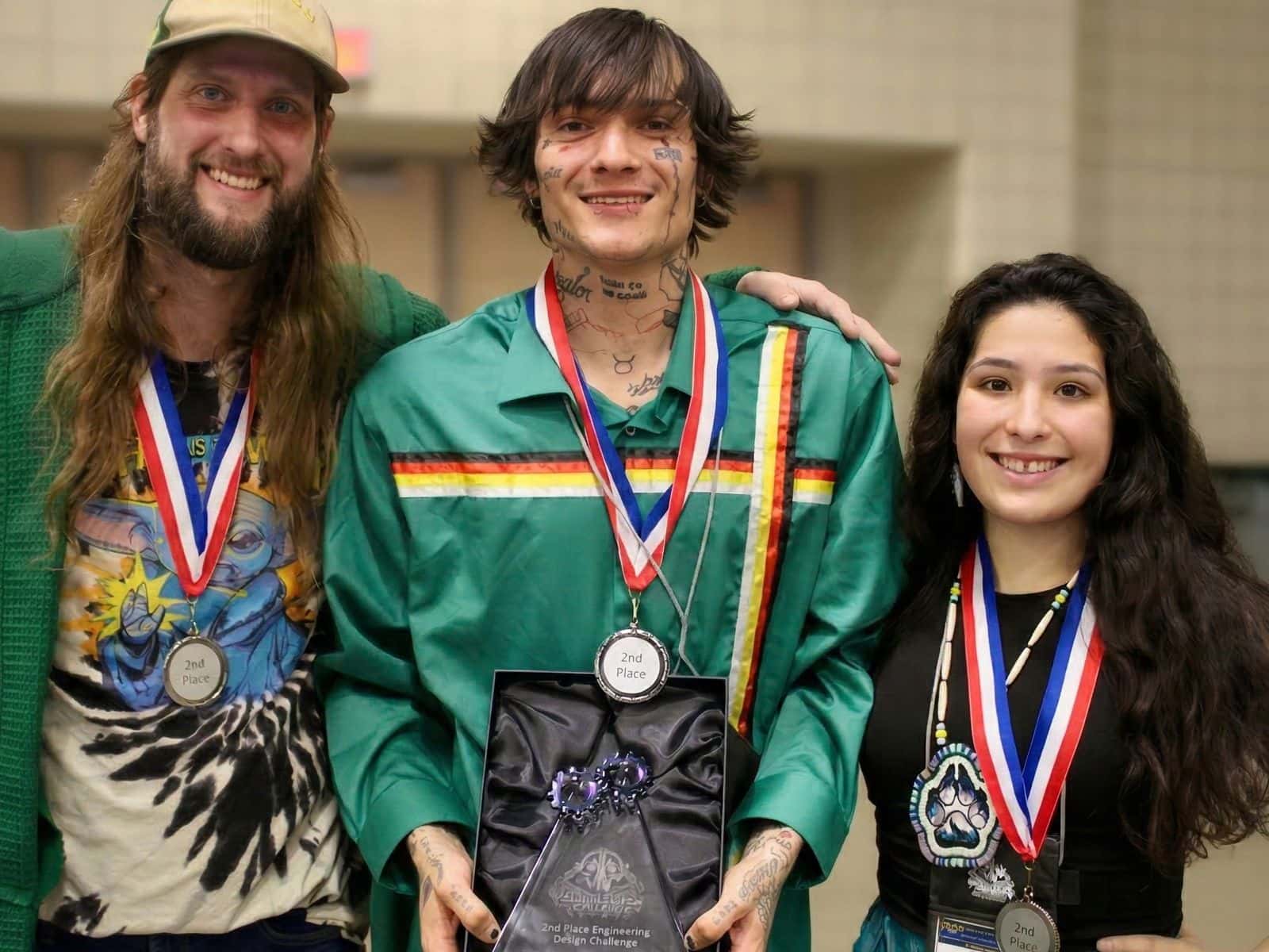 Students from Saginaw Chippewa Tribal College, Tristan Green, Mayyingan Brauker and Jade Green win second place in the engineering competition at AIHEC’s Student Awards Banquet, Bismarck, North Dakota.