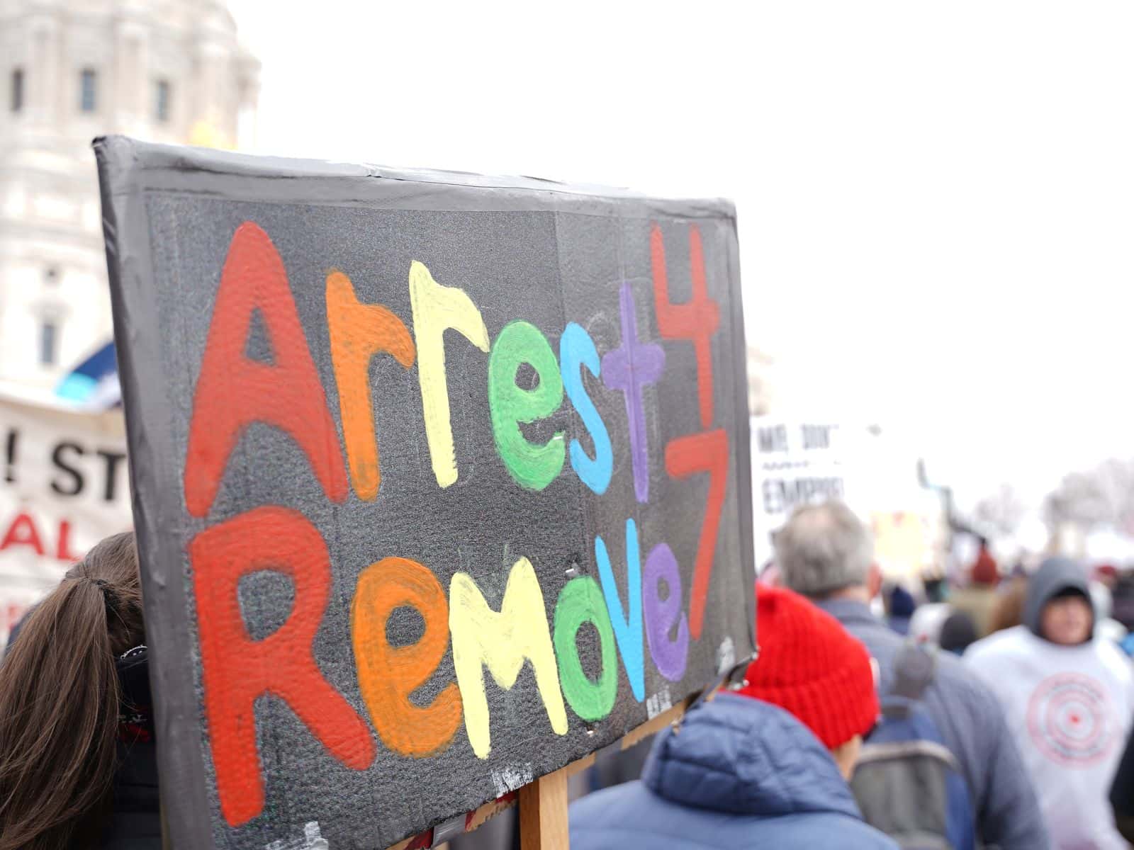 Thousands of signs called for the removal of President Donald Trump at the “No Kings” rally in St. Paul, Minnesota.