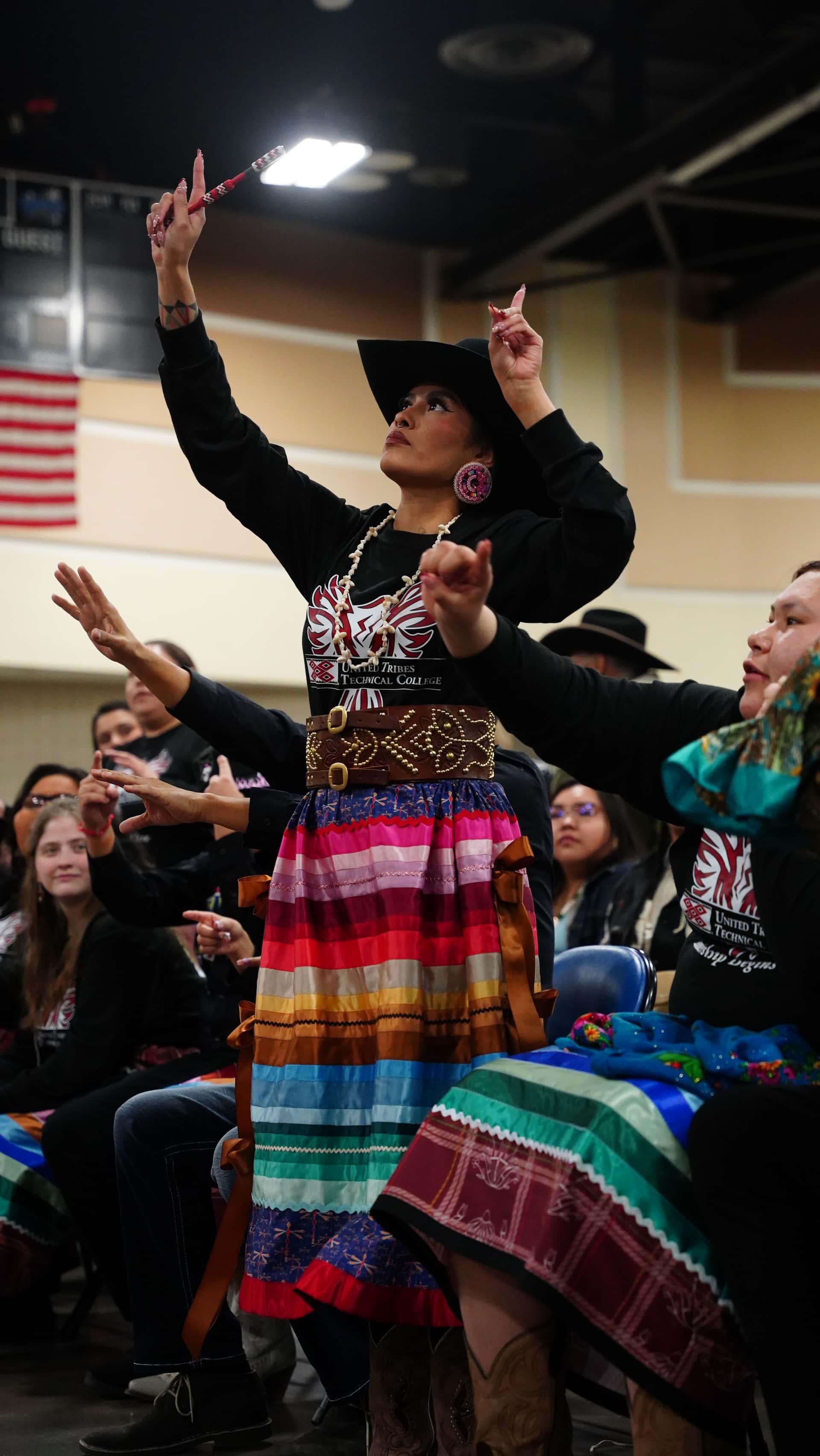 UTTC team captain Zariah Whiteplume dances in AIHEC’s annual hand game tournament, Bismarck, North Dakota.