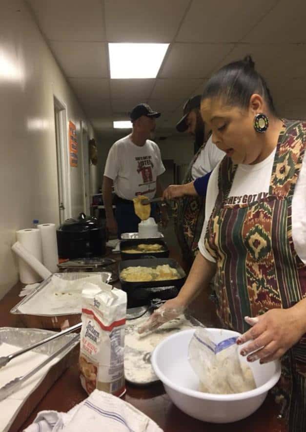 Sharon Berrun, her brother Dwayne Harris, her father HP all work together to prepare frybread for Brooke Simpson’s “Meet and Greet”. Sharon’s mom Miss Rita is Mike Mills sister, Brooke Mills is her cousin. Photo Courtesy A. Kay Oxendine.