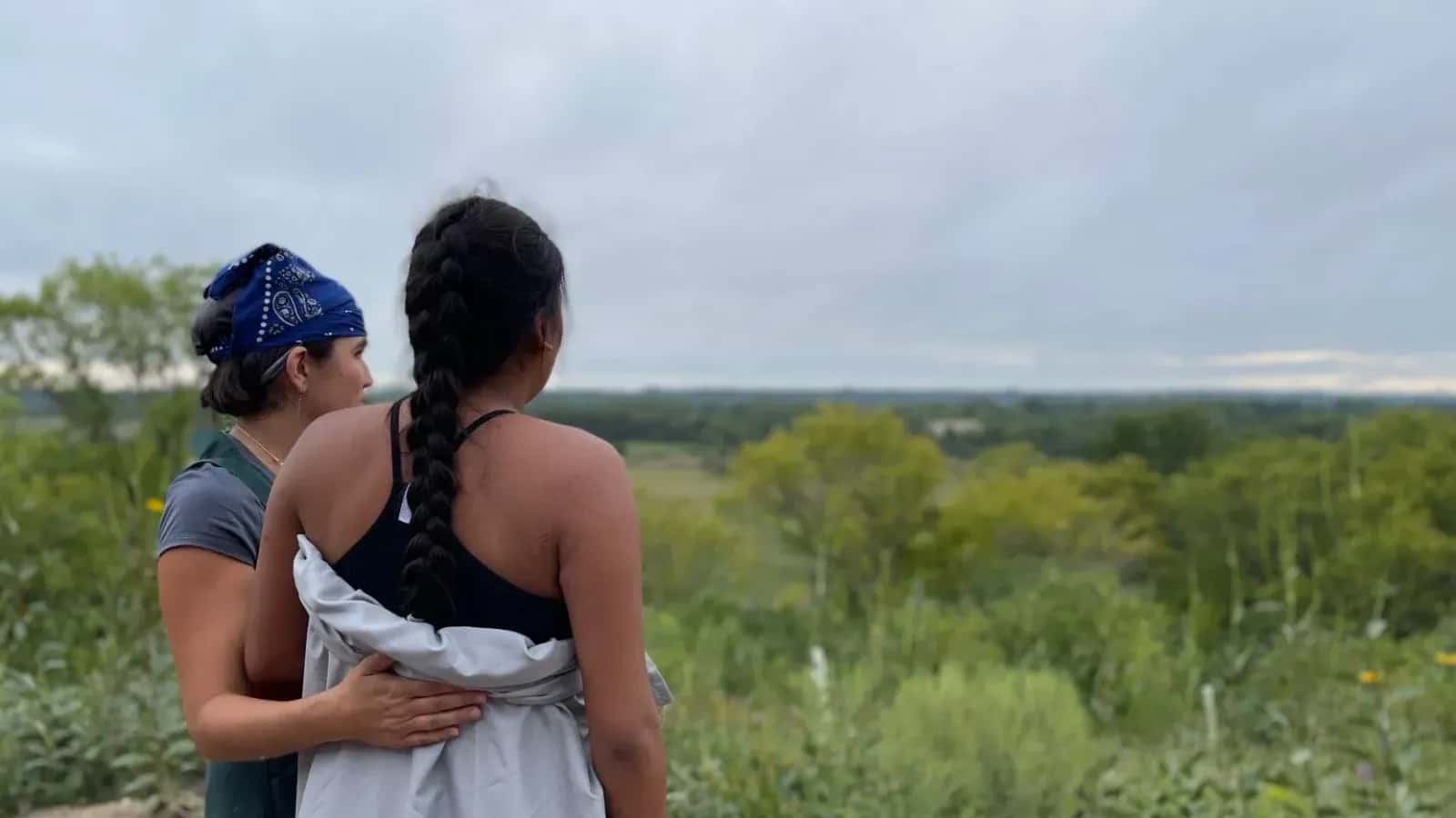 Dallis Rencountre and her midwife Autumn Cavender-Wilson watch the sunrise after the birth of Rencountre's son. (Photo courtesy of Dallis Rencountre)