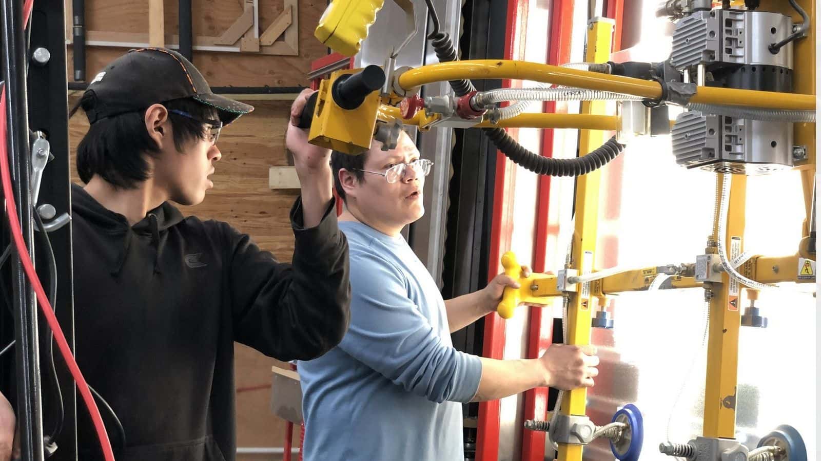 Employees at 8th Fire Solar construct thermal solar panels in Ponsford, Minn. The company is an arm of Akiing Community Development Corporation, an enity of the nonprofit organization Honor the Earth. PHOTO  CREDIT/AKIING 8TH FIRE SOLAR