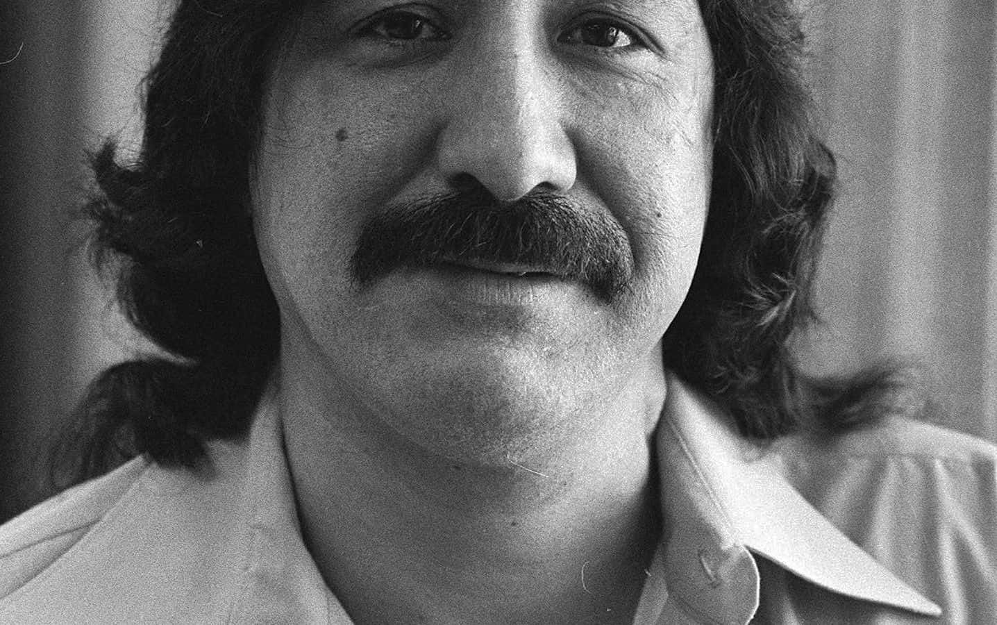 Native American activist Leonard Peltier sits for a portrait in prison in February 1986.