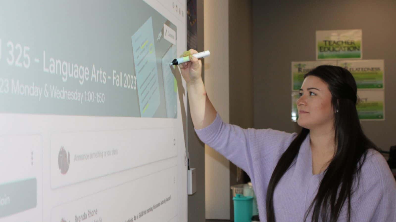 Aulora Severance, an elementary education student at United Tribes Technical College, reviews one of her lesson plans from the fall on Dec. 21. Photo credit/ Adrianna Adame