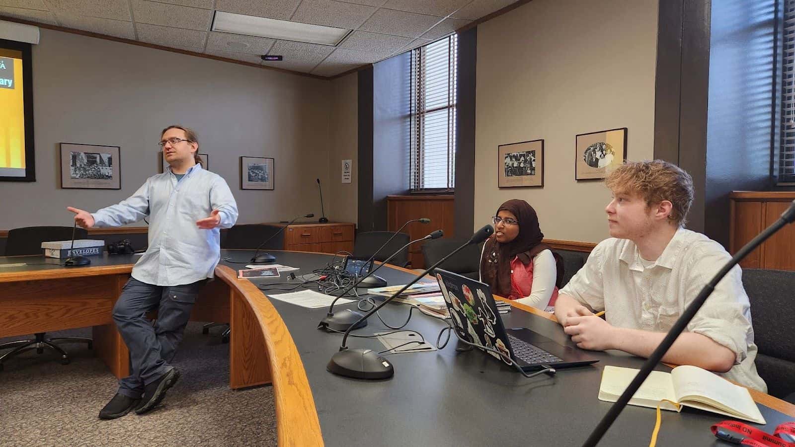 Nick Asbury, Zeineb Yousif and Morgan Campagnon spoke at the North Dakota Indian Education Summit on July 18 to discuss the updated tribal curriculum guides, which will be released next month. (Photo credit/ Vincent Moniz)