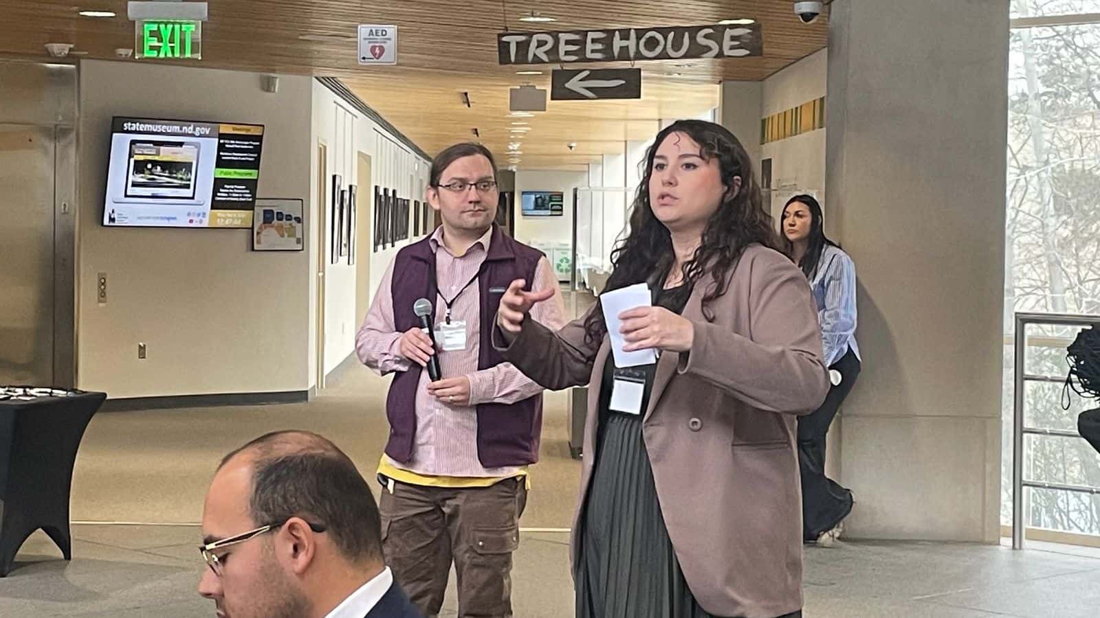 Sashay Schettler and Nick Asbury gave an update on the progress of the new curriculum guides at the 30th anniversary of the North Dakota Tribal College System at the North Dakota Heritage Center on Dec. 5. (Photo credit Adrianna Adame)