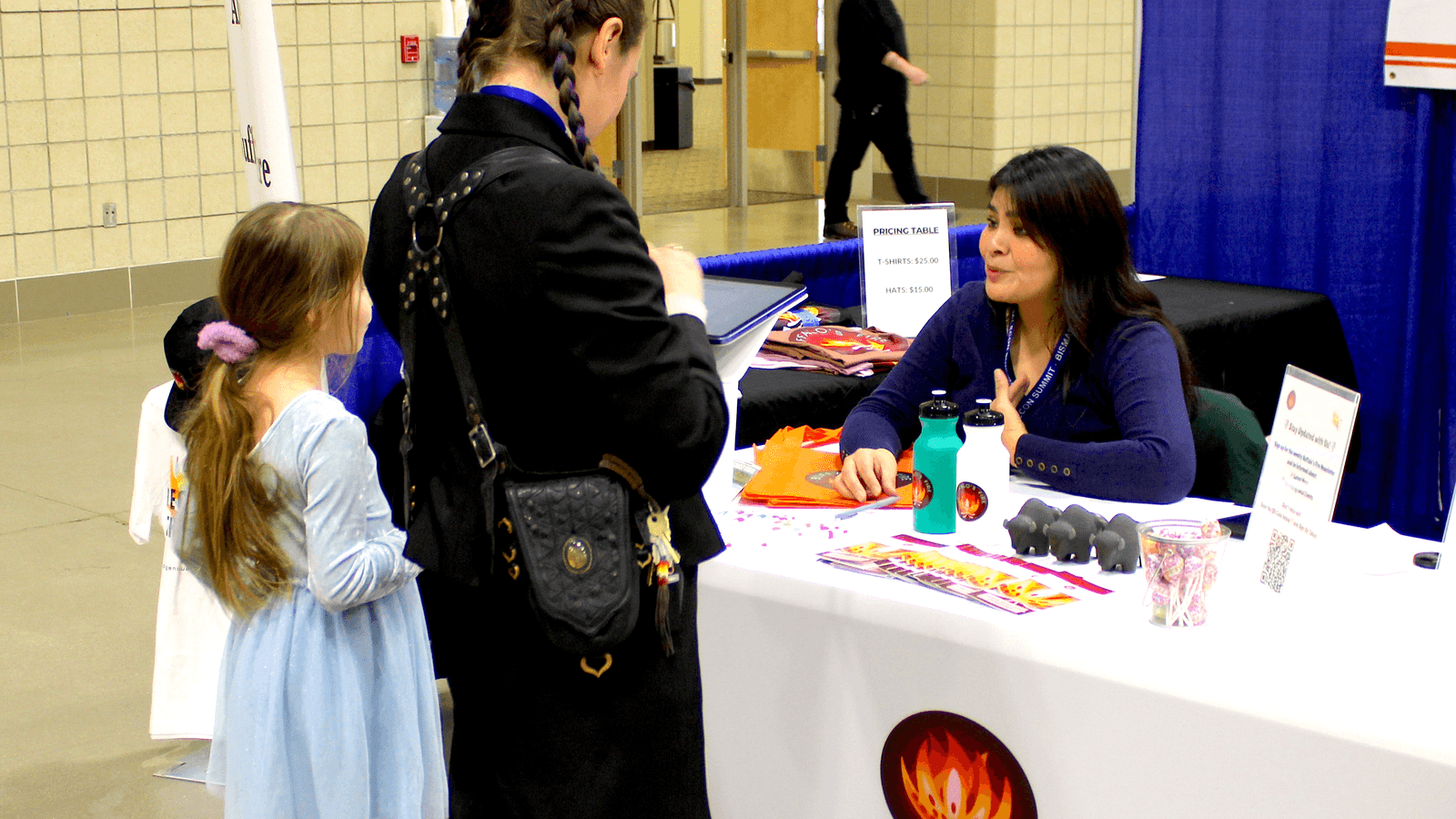 Daniela Aki, the newly appointed Documenters Site Manager at Buffalo’s Fire, engages with the community at an outreach event Jan. 23. (Photo credit/ Castle Fox)