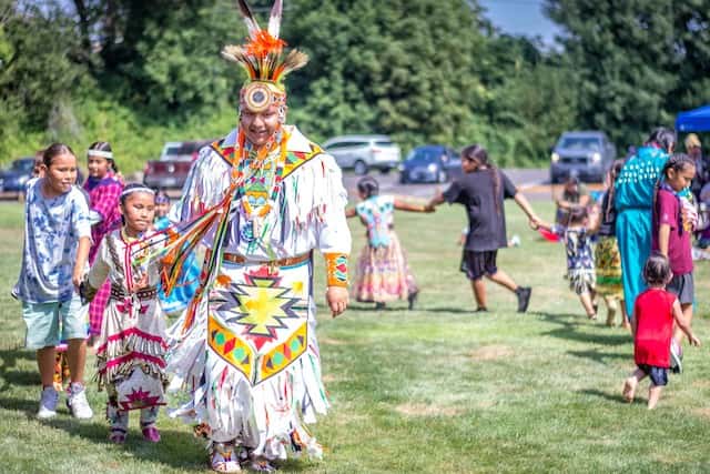 To close the Willamette Falls Lamprey Celebration on July 30, 2022, participants from the crowd were encouraged to dance together to the beat of the drum in a social dance called the ‚Äúeel dance‚Äù that honored the lamprey eaten that day. Photo by McKayla Lee/Underscore News