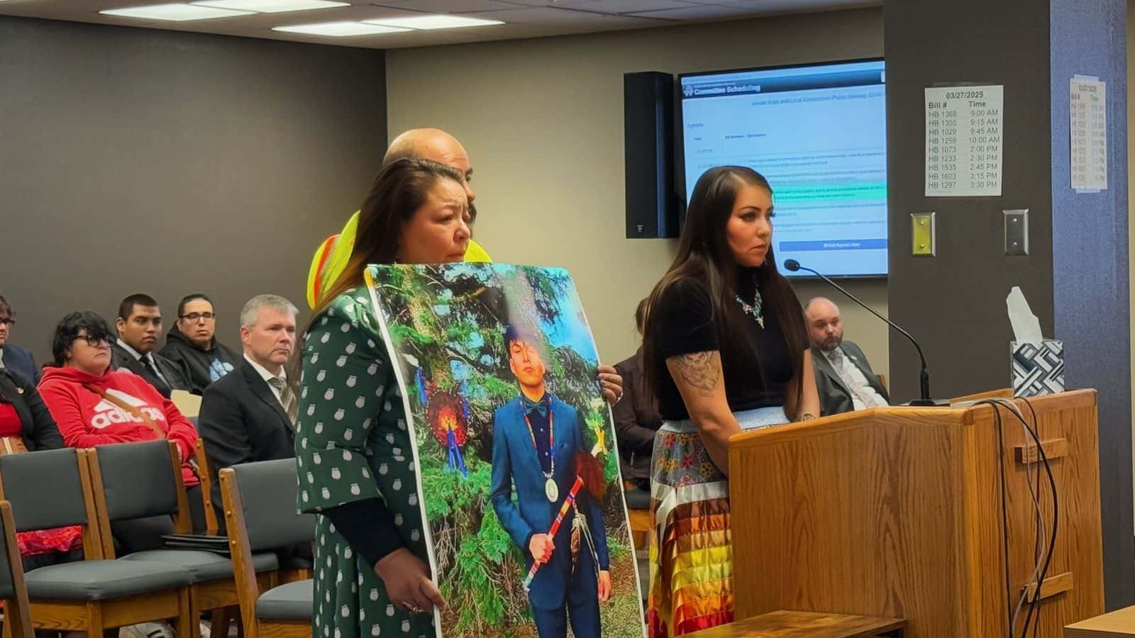 Renzo Bullhead’s family stands together at the podium, testifying in the North Dakota Legislature in support of HB 1535. (Photo credit: Vicky Alberts)