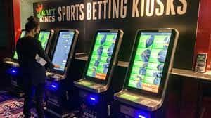Zach Young, of New Haven, Conn., places a bet at one of the new sports wagering kiosks at Foxwoods Resort Casino in Mashantucket, Conn., Thursday, Sept. 30, 2021. Young says he's been "waiting for this day," recalling how he'd often scroll through sports betting apps he couldn't play in preparation. The unveiling of temporary sports betting venues at the state's two tribal casinos, Foxwoods and Mohegan Sun, mark the first step in the rollout of Connecticut's new law legalizing sports and online wagering. (AP Photo/Susan Haigh)
