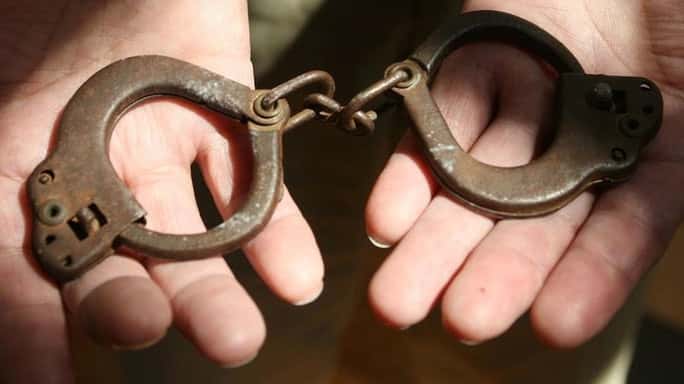 Photo of tiny handcuffs at Haskell by Mary Annette Pember.