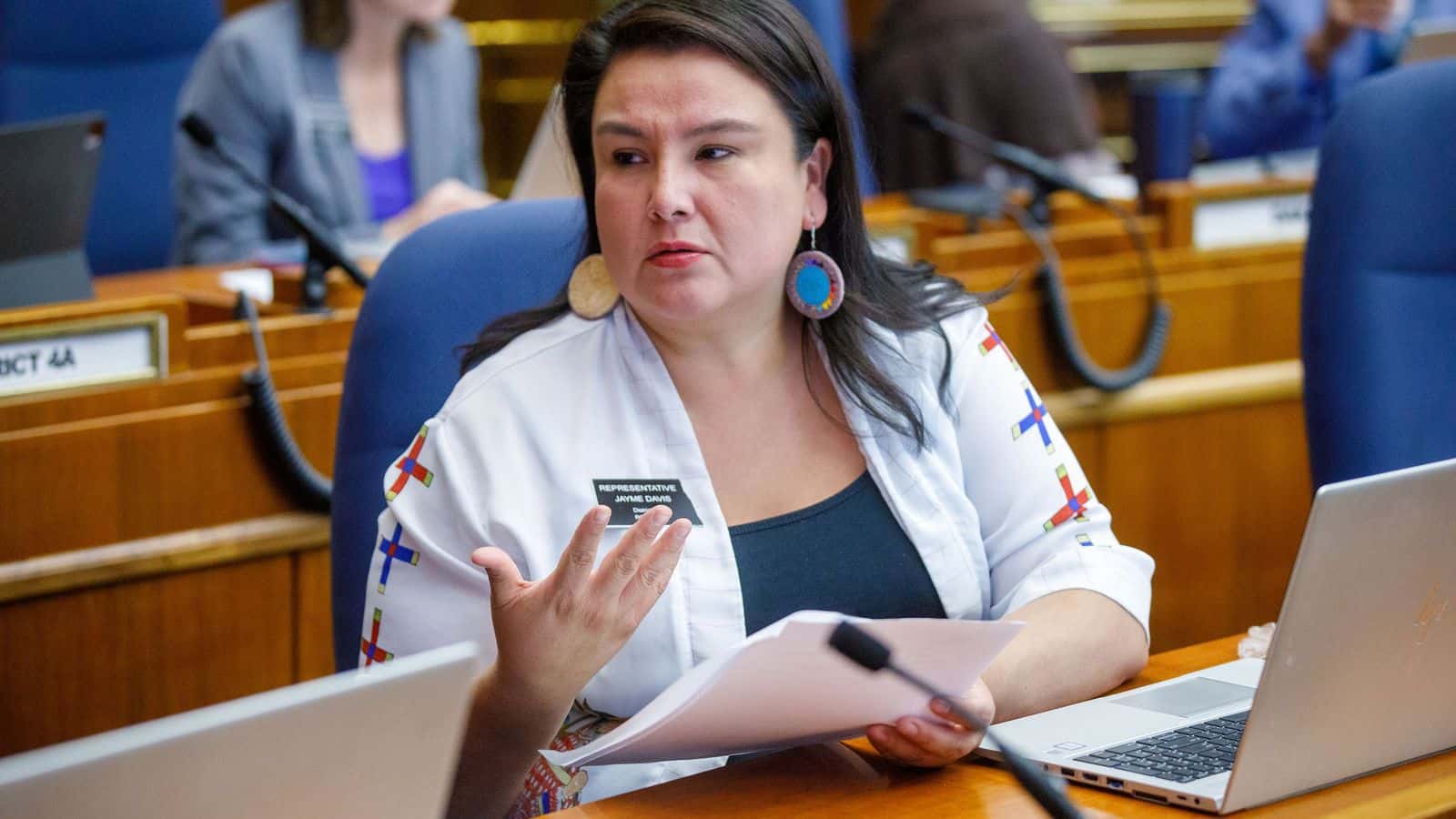 North Dakota Rep. Jayme Davis, D-Rolette, discusses a bill draft with a colleague on Oct. 23, 2023, during the special legislative session. She is among the lawmakers running for election this year due to a judge's order in a redistricting lawsuit. (Kyle Martin/For the North Dakota Monitor)