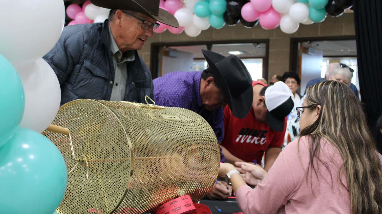 MHA Nation elders and guests try their luck at cash bingo and a door prize raffle during a summer luncheon at the 4 Bears Casino Event Center on the Fort Berthold Reservation, July 16. (Photo credit: Gabrielle Nelson)