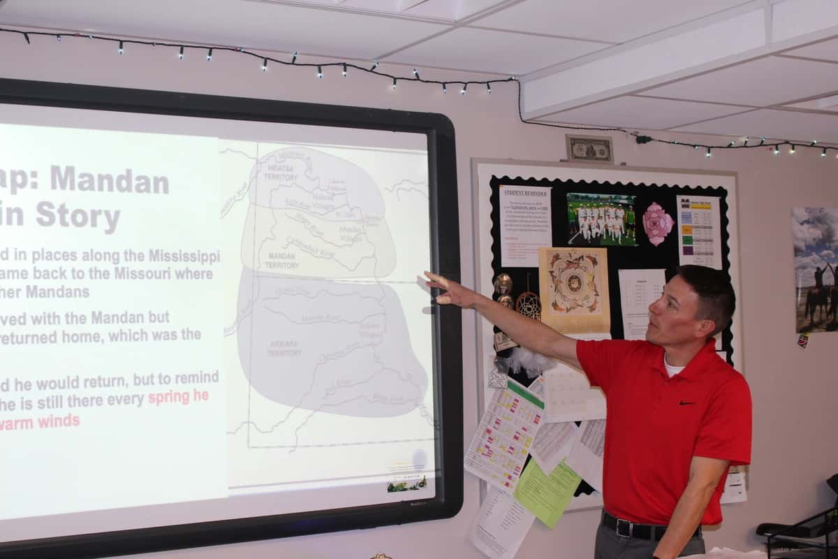 Robert in front of the board