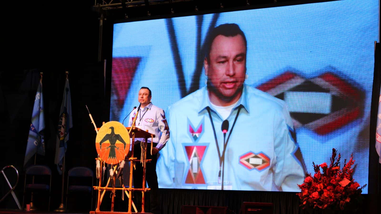 Cody Two Bears, founder and executive director of Indigenized Energy, opens the second day of the UTTC Tribal Summit with a call to action for tribes to unite in times of hardship, Bismarck, North Dakota, Sept. 4, 2025. (Photo credit: Gabrielle Nelson)