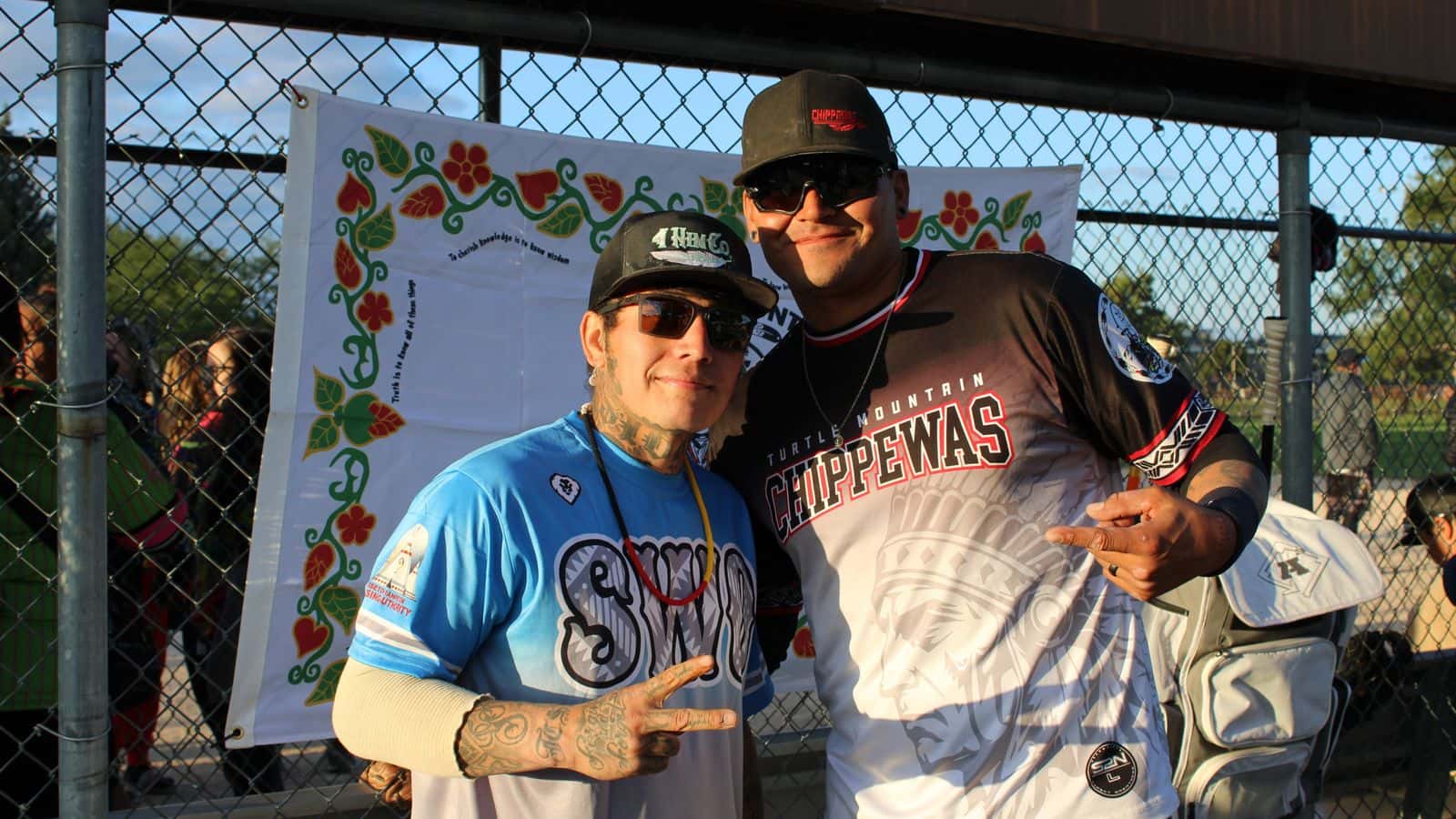 Rivals and ‘brothers’: Angelo Shepard, Sisseton Wahpeton Oyate, and Skylar Keplin, Turtle Mountain Band of Chippewa Indians, pose together in a show of solidarity between competing teams. The two played against each other twice for the Band of Nations softball tournament, Bismarck, North Dakota, Sept. 5, 2025.(Buffalo's Fire Photo/Gabrielle Nelson)