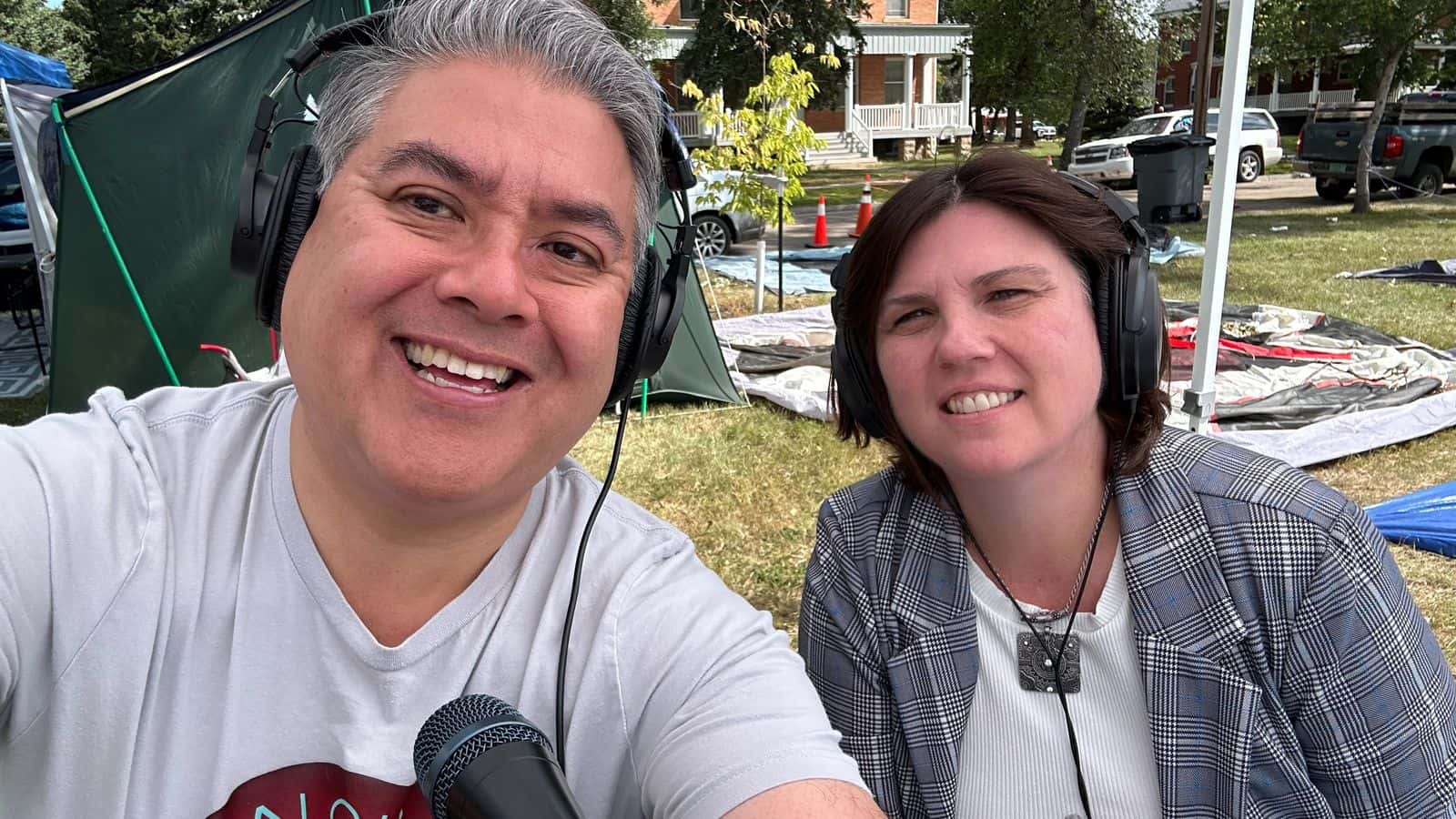 Buffalo’s Fire Brian Bull (left) and Prairie Public’s Ann Alquist cover the UTTC powwow live. (Sept. 6.) (Buffalo’s Fire Photo/Brian Bull)