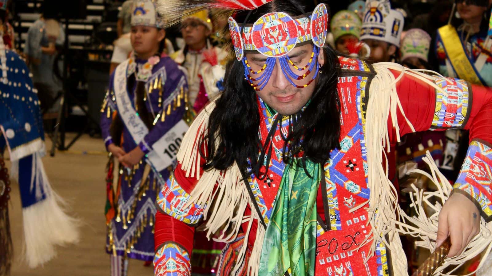 A powwow attendee dances in the first grand entry, Bismarck Event Center, North Dakota