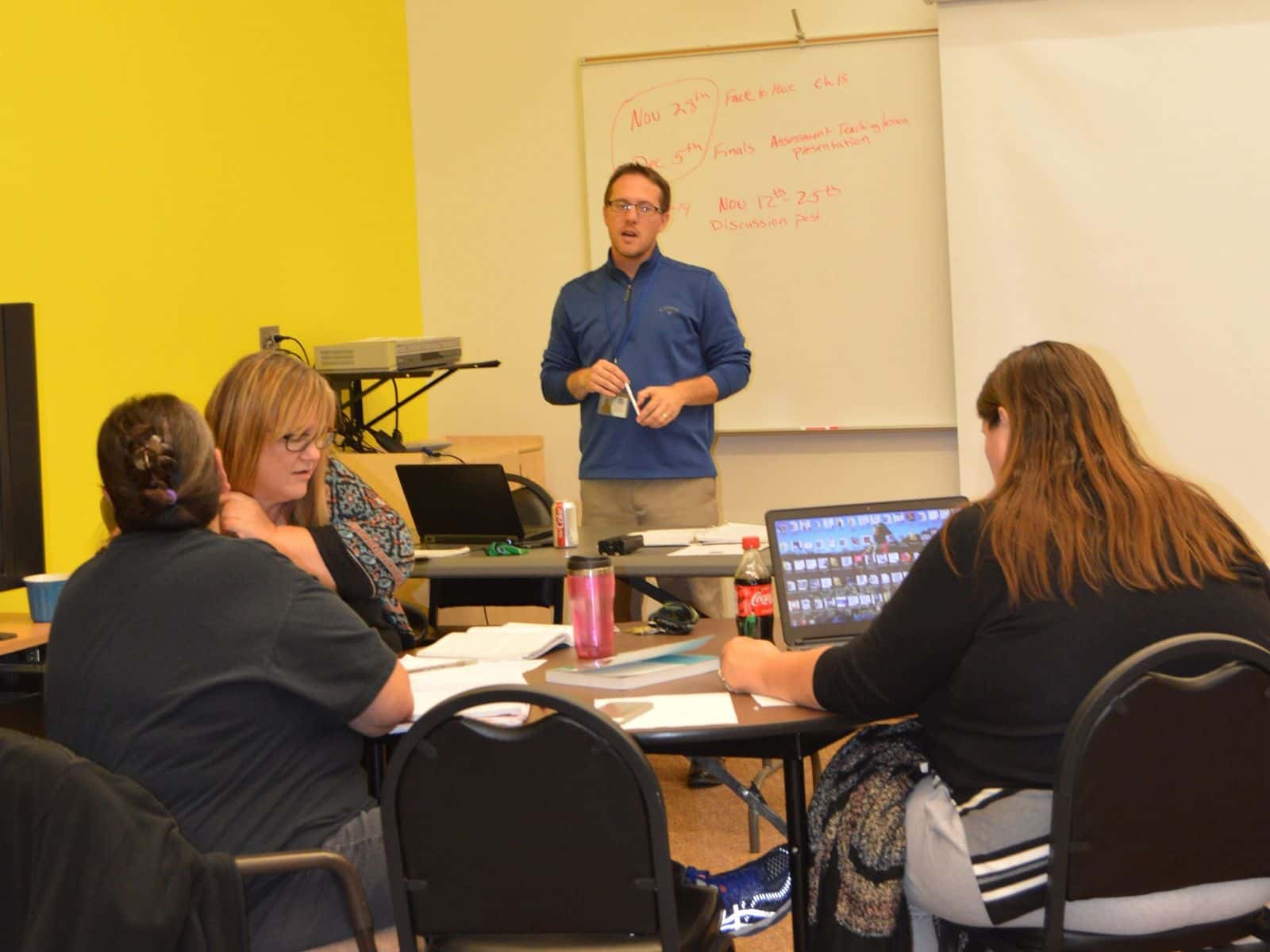 Chris in front of students