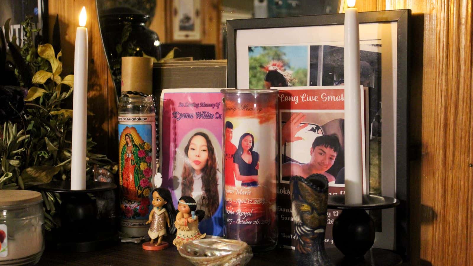 An altar in Brittney Rough Surface-Arnett’s living room memorializes Hoksila Running Bear and his daughter’s mother, Kyann Marie White Owl, Mandan, North Dakota.