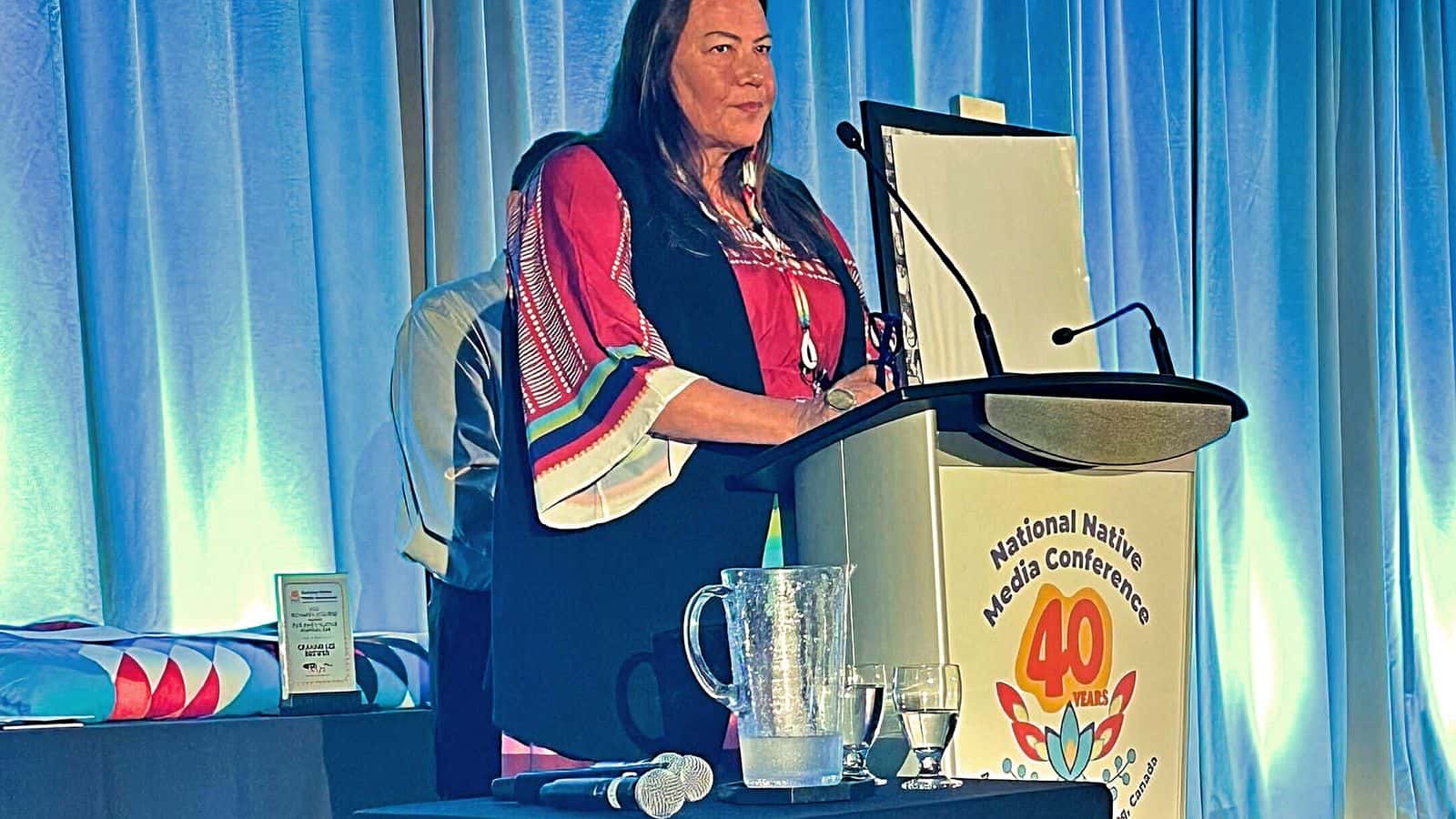 Jodi Rave Spotted Bear addresses about 400 Canadian and U.S. journalists on Aug. 12 during her acceptance speech of the inaugural Tim Giago Free Press Award. The awards banquet took place during the 40th Annual National Native Media Conference  in Winnipeg, Manitoba. Photo/Indigenous Journalists Association