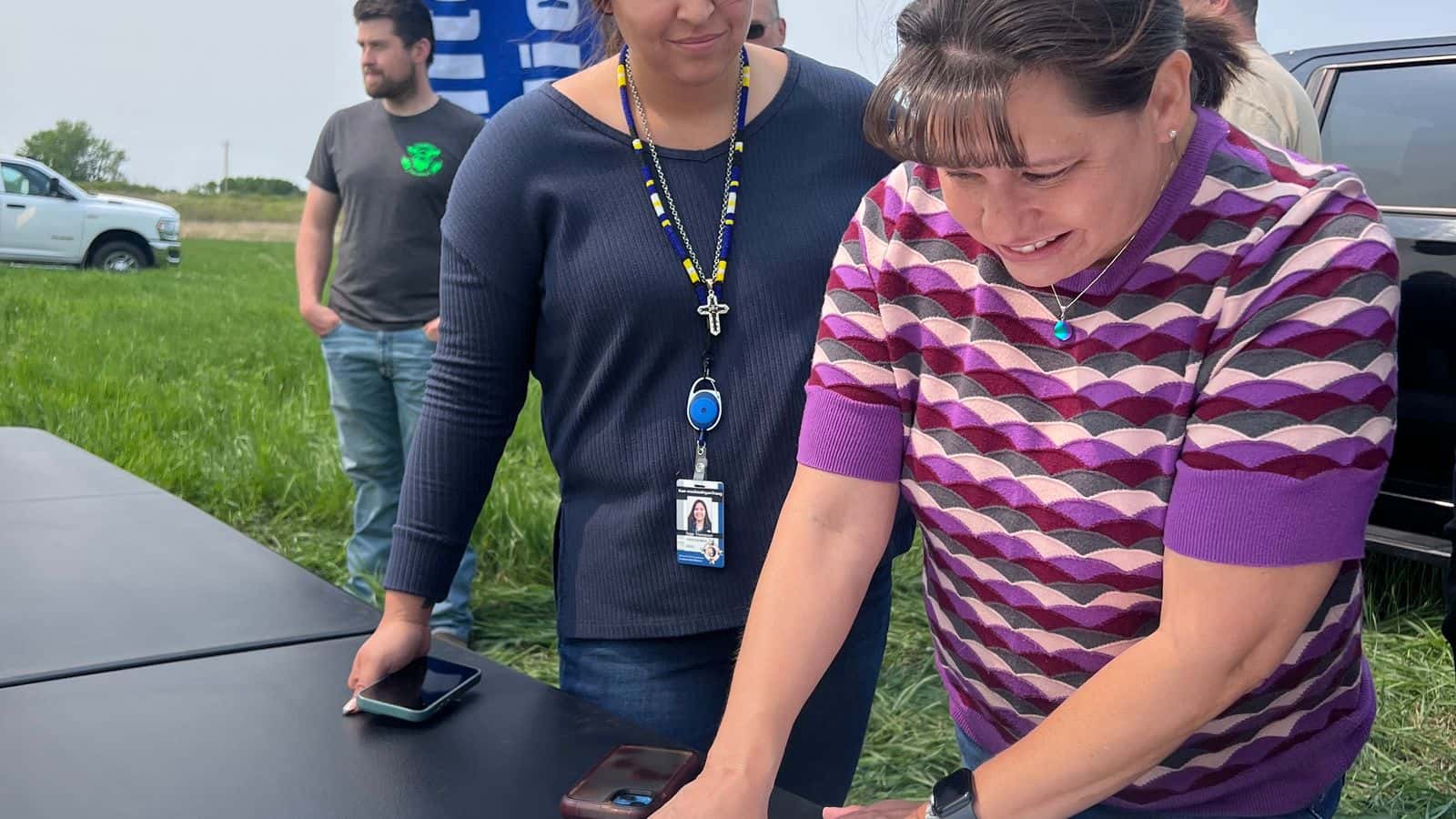 Rep. Laura Lee Erickson, White Earth Nation District 3 leader, looks at architectural designs on Friday, May 30, 2025 during the groundbreaking for tribe’s transit station.