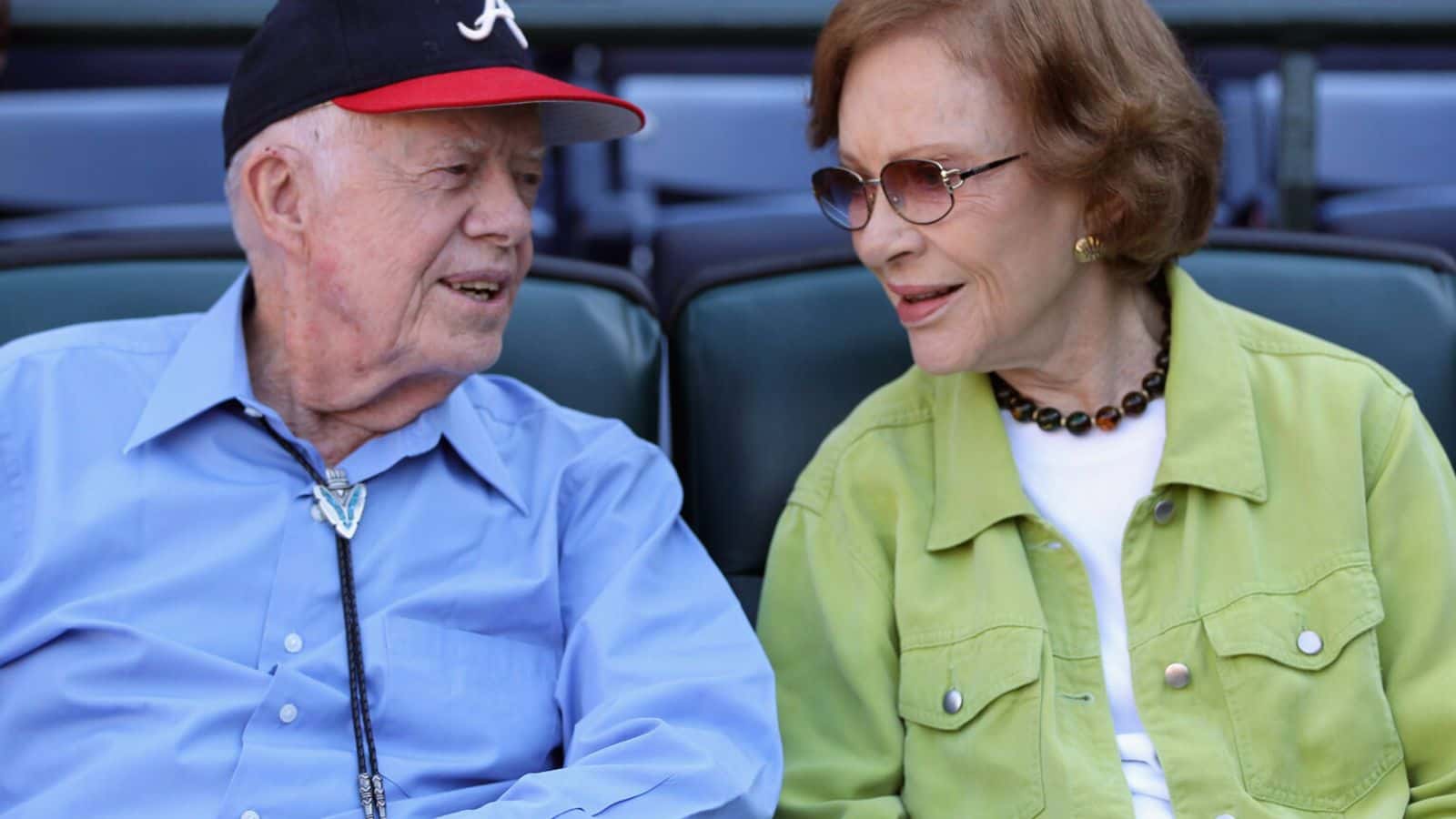 Former President Jimmy Carter and wife Rosalyn converse prior to the start of Game Three of the NLDS of the 2010 MLB Playoffs between the Atlanta Braves and the San Francisco Giants on October 10, 2010 at Turner Field in Atlanta, Georgia. (Photo by Jamie Squire/Getty Images)