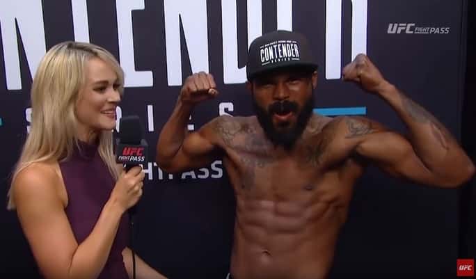 Jordan Griffin flexes and gives a yell of elation after getting a UFC contract. YouTube screen capture.