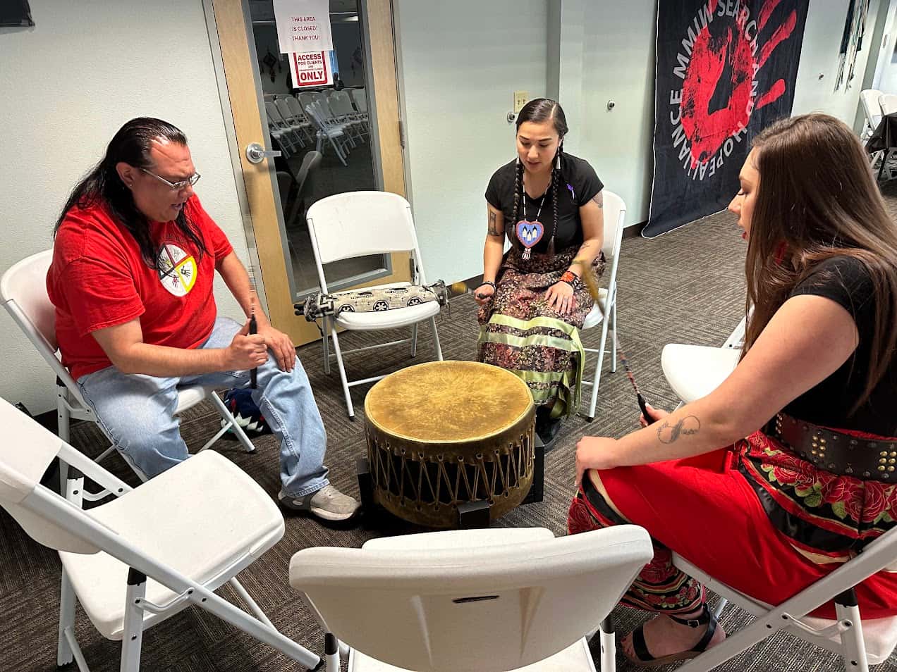 (From L to R:) Josh Piatro, Gloria Martinez and Christina Garcia do an honor song for MMIP’s victims, families and communities, Saturday, May 3, 2025.