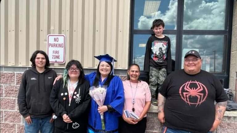 Dale Boushie stands with her family upon graduating from Blackfeet Community College's new BSN program. (Courtesy photo)