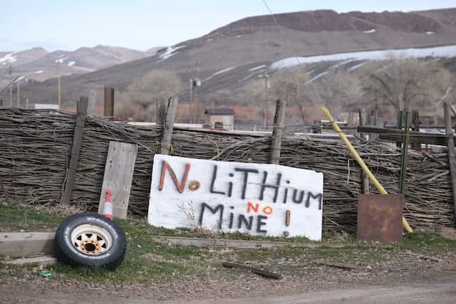A sign opposing the proposed Thacker Pass lithium mine is displayed on Elwood Hinkey's property on the Fort McDermitt Indian Reservation in Nevada on March 11, 2022. Hinkey made the sign for his granddaughter to take to a protest camp. (Photo by Alex Milan Tracy for Underscore)