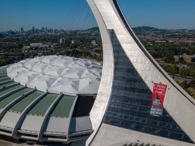 Days before the federal government is slated to move forward with spending $4.5 billion of public money to buy the Trans Mountain Expansion pipeline, five activists with Greenpeace Canada climbed Montreal’s Olympic Park tower (the world's tallest inclined building) deploying a giant (10 x 25 meter) banner which reads, "Don’t Dirty our Money: Stop Pipelines", sending a powerful message to Prime Minister Trudeau. Photo: Greenpeace
