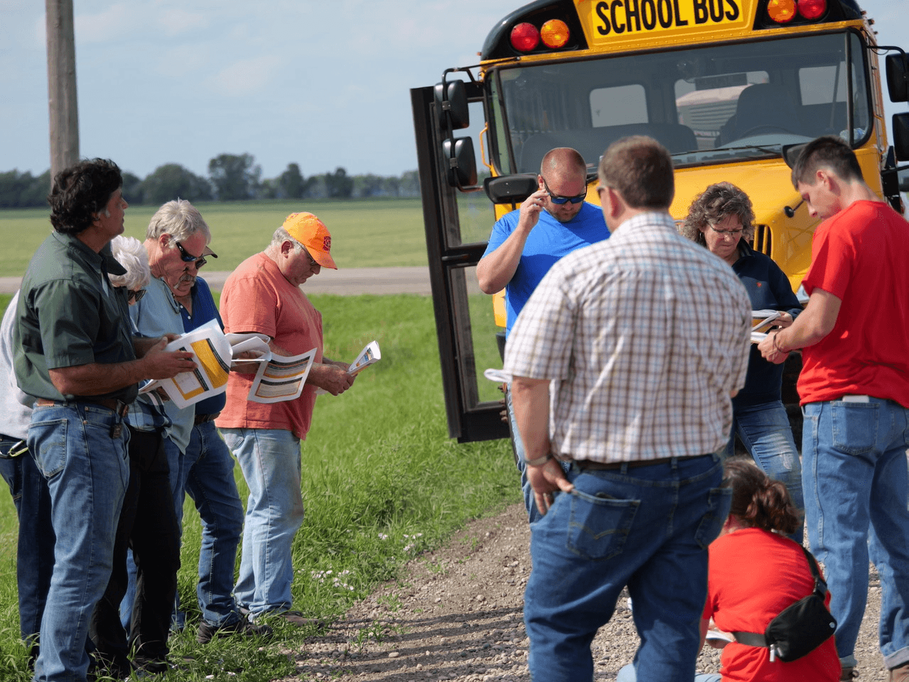 A Walsh County Soil Health Tour brought together 40 participants to learn more about soil loss, erosion and soil health in July 2023. Here, Naeem Kalwar [left side in the green shirt], a soil health specialist from the NDSU Langdon Research Extension Center, leads the talk. Photo provided by Josh Anderson, Walsh County district conservation manager. 