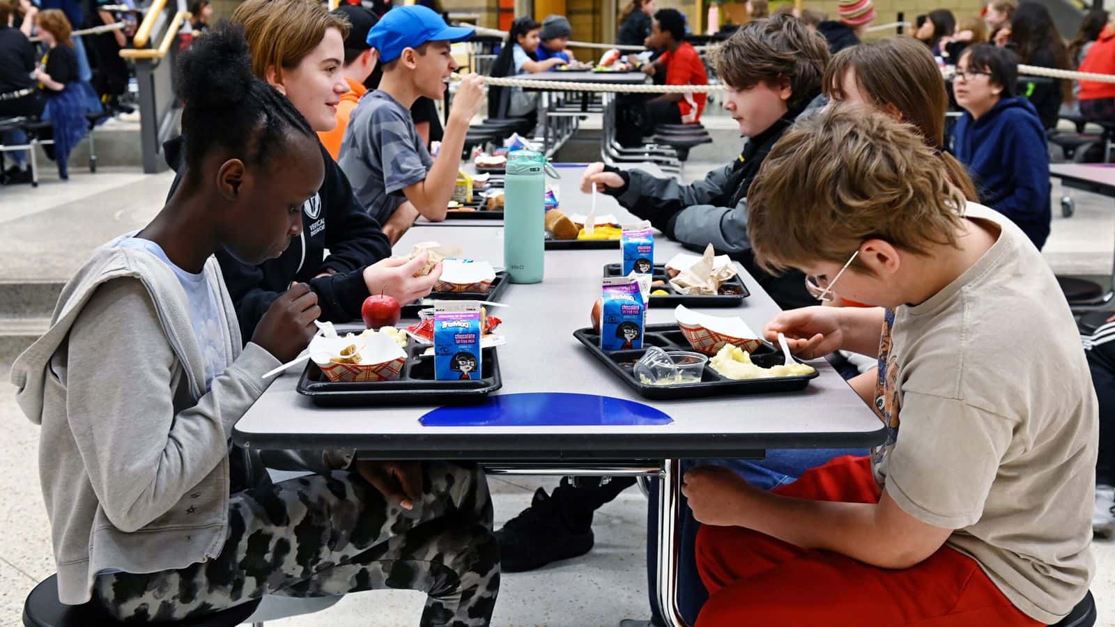  Students eat lunch at Carl Ben Eielson Middle School in Fargo on Jan. 22, 2025. Free school meal advocates in North Dakota are calling on the state Legislature to prioritize permanent funding to pay for meals. (Dan Koeck/For the North Dakota Monitor)