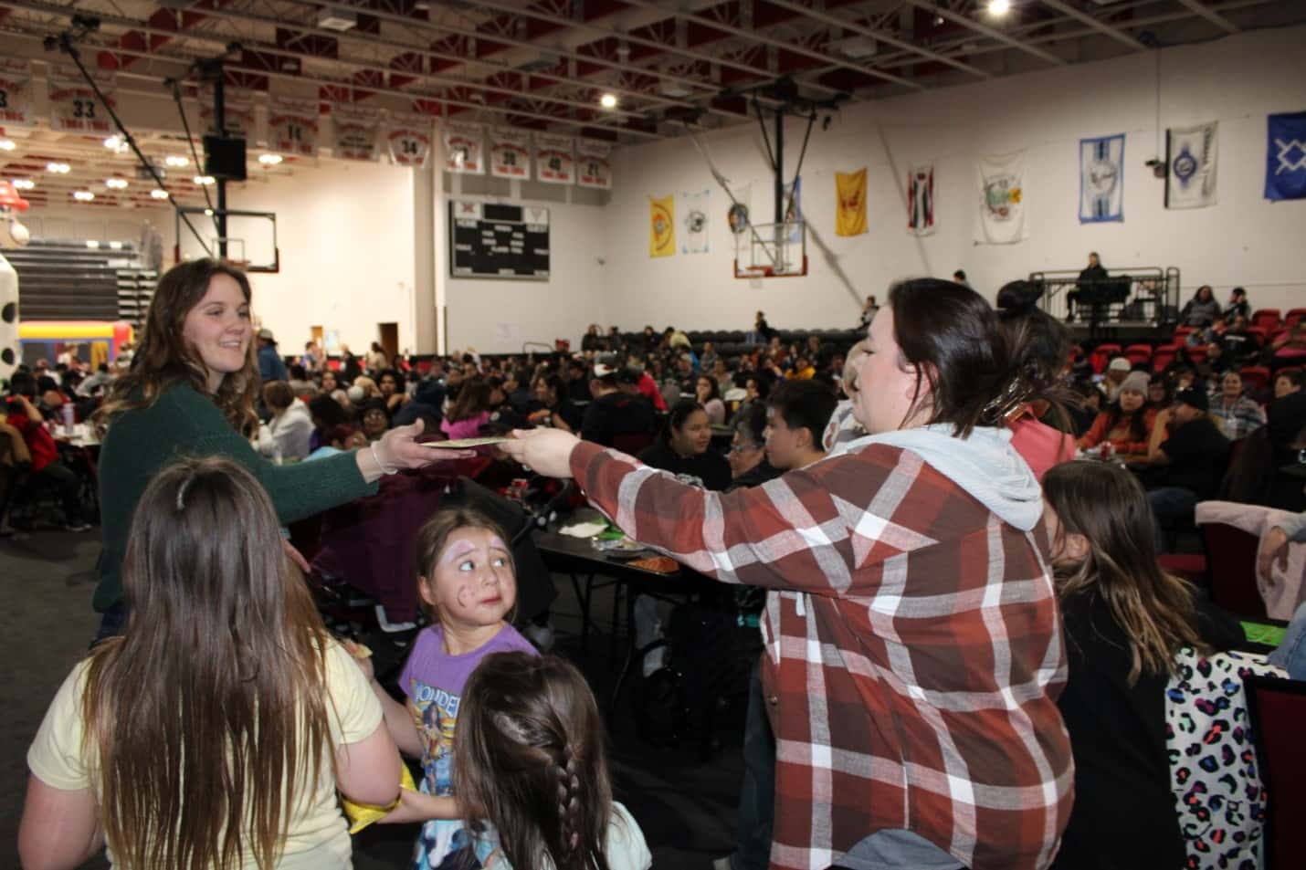 Bingo cards are handed out during the Spring Equinox celebration, the first multi-collaborative effort of Bismarck and Mandan K-12 public school leaders. It’s estimated that 500 Native students and their family members attended the March 22 gathering at United Tribes Technical College. 