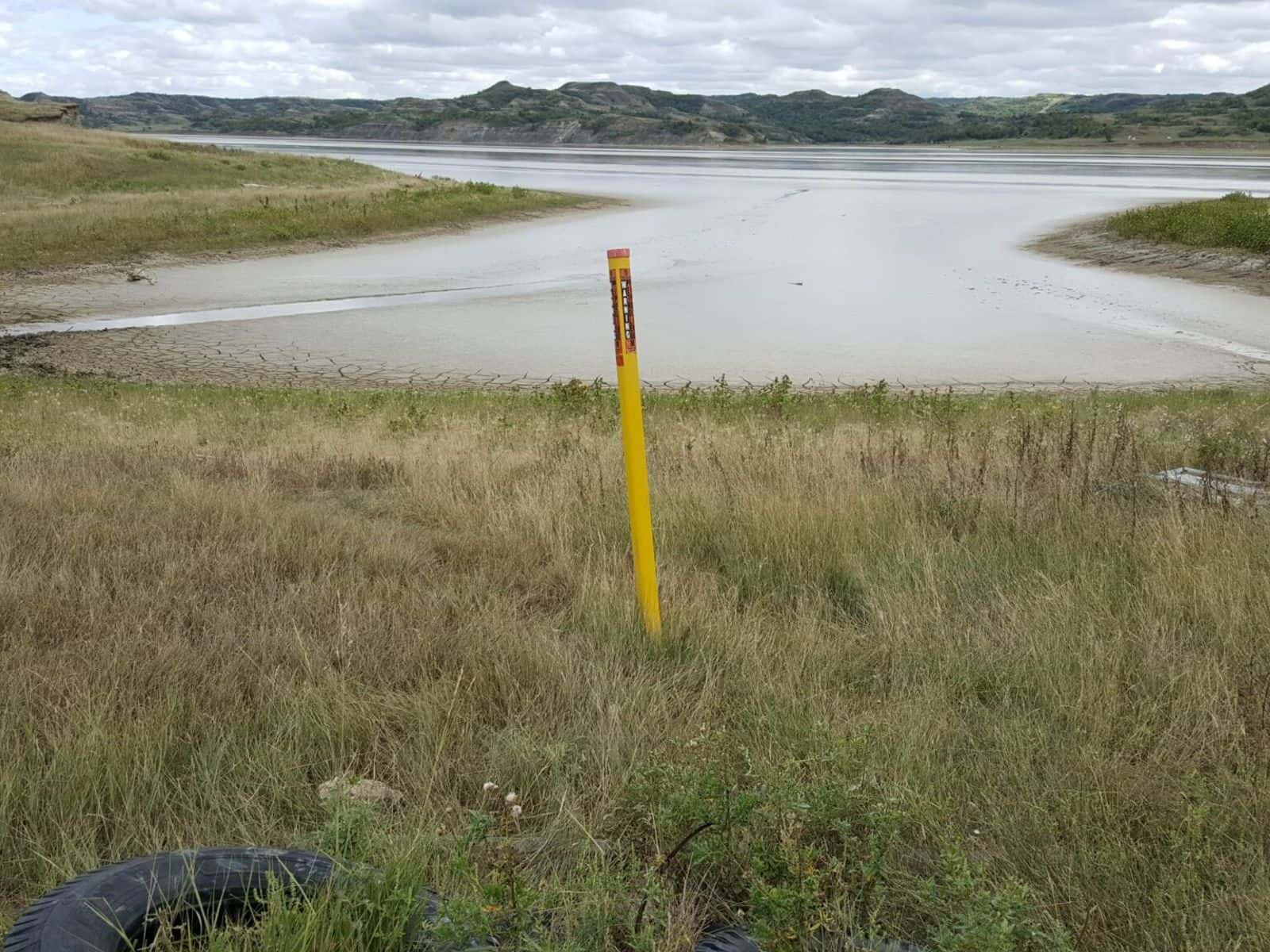 The Tesoro High Plains Pipeline carries crude oil beneath the Little Missouri River beyond the boundaries of the Fort Berthold Reservation in North Dakota. A Biden administration official wants a fresh look at the multi-million-dollar dispute between hundreds of Three Affiliated Tribes landowners and the pipeline company. Credit: Jodi Spotted Bear/Buffalo's Fire