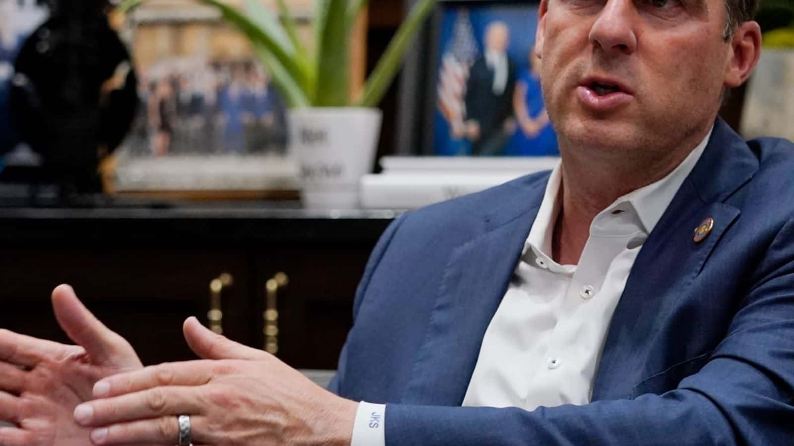 Oklahoma Gov. Kevin Stitt is pictured during an interview in his office Wednesday, Aug. 3, 2022, in Oklahoma City. The Oklahoma Board of Pardon and Parole has recommended clemency for death row inmate James Coddington. Stitt said that he hasn't been formally briefed on Coddington's case, but that with any clemency recommendation, he meets with prosecutors, defense attorneys and the victim's family before making a decision. (AP Photo/Sue Ogrocki)