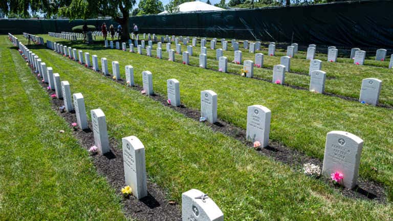 Headstones at the cemetery on the grounds of the former Carlisle Indian Industrial School in Pennsylvania mark the graves of children who died at the school. (Photo by the Associated Press)