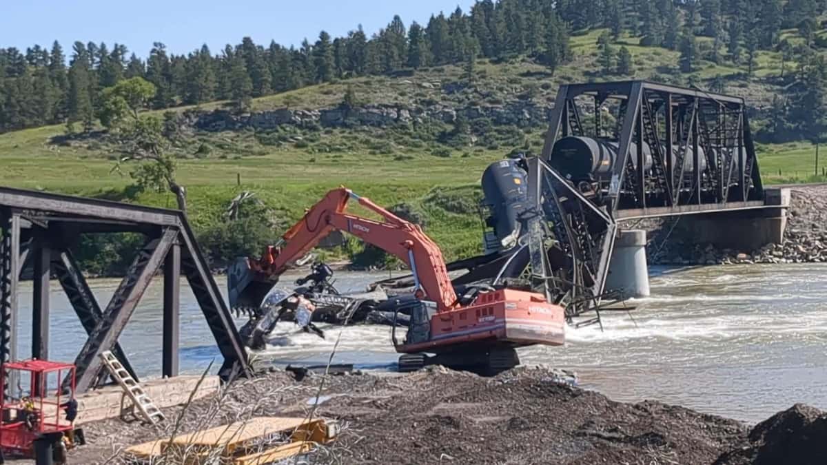 Heavy equipment operators work at the site of a Montana Rail Link train derailment on June 29, 2023. Credit: Courtesy U.S. Environmental Protection Agency