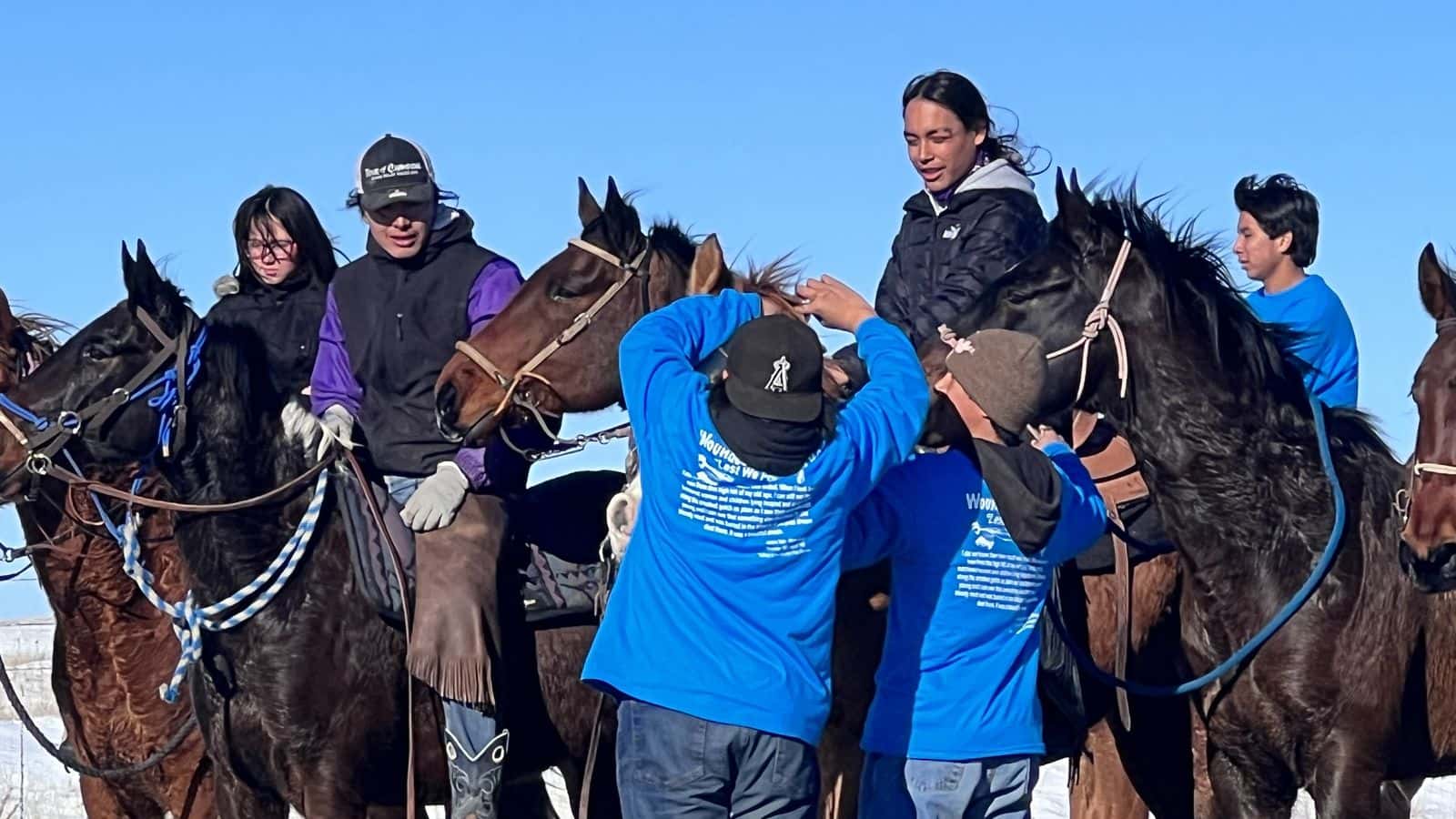 On a stop between Wounded Knee, S.D. and Pine Ridge, S.D, Oomaka Tokatakiya, Future Generations Riders make the final leg of a 300-mile journey on Dec. 29. The ride commemorates  the Wounded Knee Massacre of Dec. 29, 1890. Photo Credit/Jodi Rave Spotted Bear