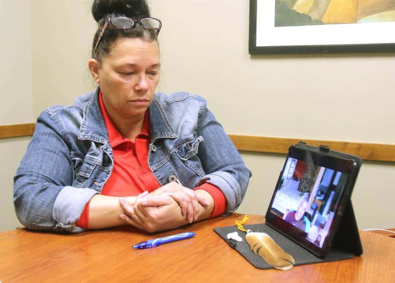 DeKalb County Board member Terri Mann-Lamb, part of the Ramapough Lenape Nation, a band of the Munsee people who originally settled in New Jersey thousands of years ago, listens to her brother, Ramapough Lenape Nation Turtle Clan Chief Vincent Mann, talk via Zoom call Tuesday, Oct. 26, 2021, about issues facing Native Americans today. (Mark Busch - mbusch@shawmedia.com)

Shaw Local News Network