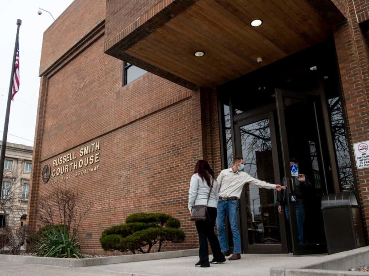 Michael DeFrance, right, is seen leaving the Russell Smith federal courthouse in Missoula in November 2021 (Photo by Ben Allan Smith, Missoulian)