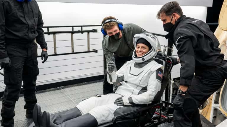 NASA astronaut Nicole Mann, Wailacki of Round Valley Tribes, taken out of the Dragon capsule on a stretcher as part of the recovery activities from space. SpaceX Crew-5 splashed down off the coast of Florida at 9:02 p.m. Eastern Time on March 11, 2023, after five months on the International Space Station. (Photo courtesy of NASA)