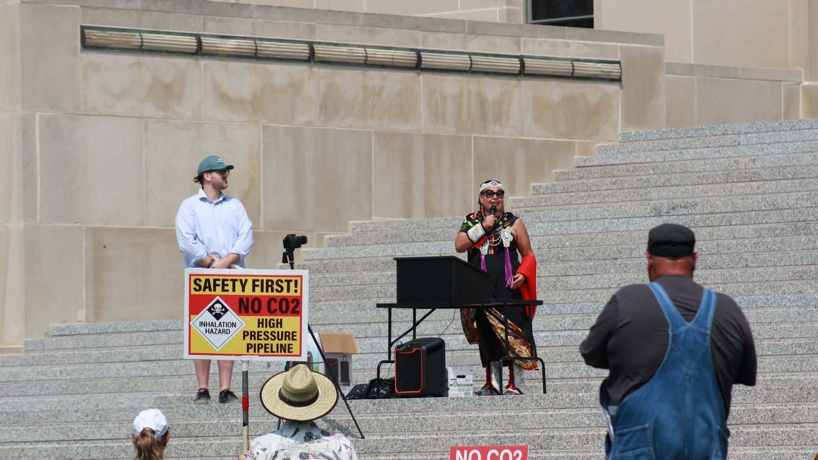 Wilkie addresses North Dakotans gathered to oppose Summit Carbon Solutions proposed pipeline in July (Photo credit: Grace Fiori).